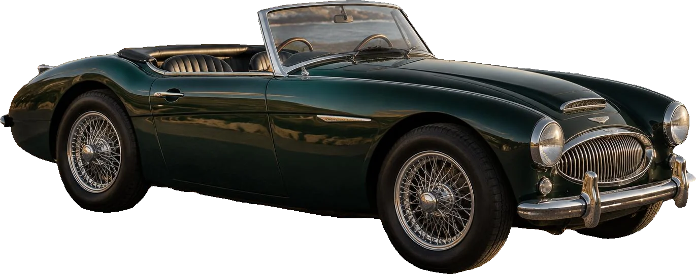 Dark green classic roadster, three-quarter front view
